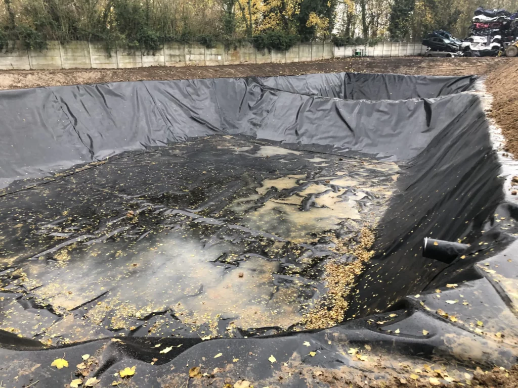 Bassin étanche par géomembrane pour la gestion des eaux pluviales et le D9A d'un site industriel